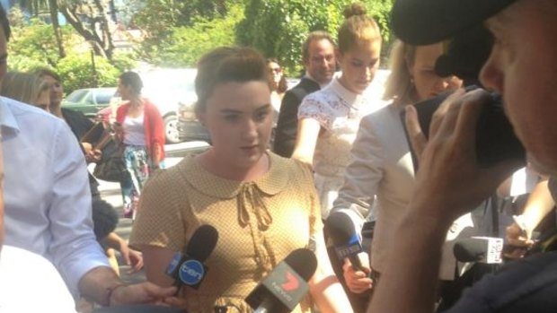 Olivia Mead leaves court after being awarded $25 million. 