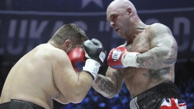 Who's the Daddy?: Australia's Lucas Browne batters Ruslan Chagaev on his way to victory in the WBA world heavyweight clash.