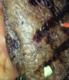 The apparently worm-infested steak that was served.