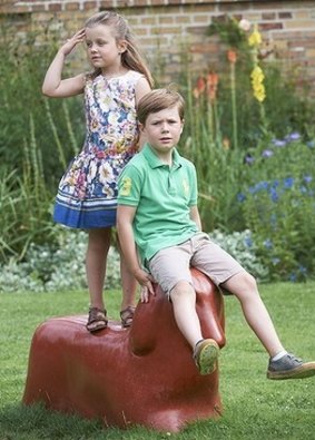 Prince Christian sitting alongside his younger sister, Princess Isabella.