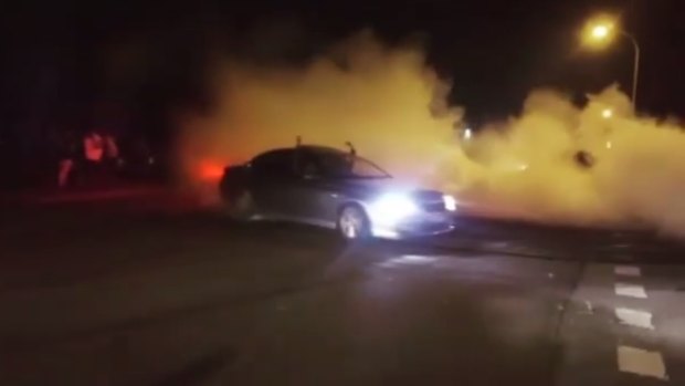 A Ford does burnouts in footage of the meeting posted on Instagram.