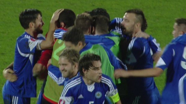 Like a win: San Marino players celebrate after holding Estonia to a 0-0 draw early this month.