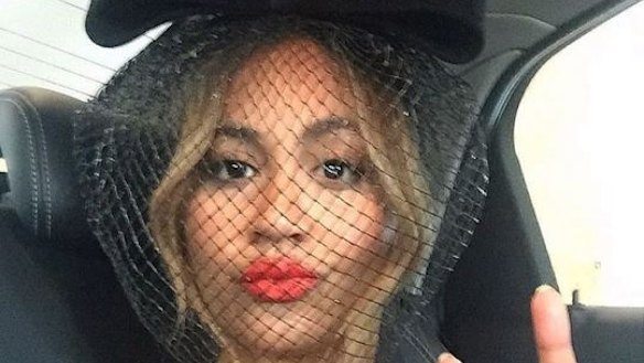 Jessica Mauboy appeared happy en route to Tuesday's Melbourne Cup