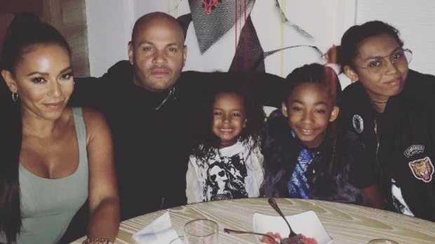 Mel B with her estranged husband Stephen Belafonte, their daughter Madison, middle, and Mel B's daughters from previous relationships, Angel and Phoenix.