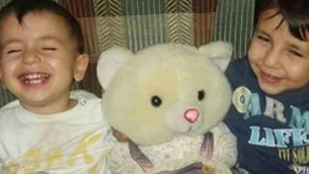 Aylan Kurdi, left, with his brother Galip.