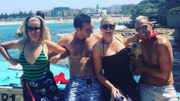 Samantha Armytage with her friends and her dog at North Bondi last weekend.