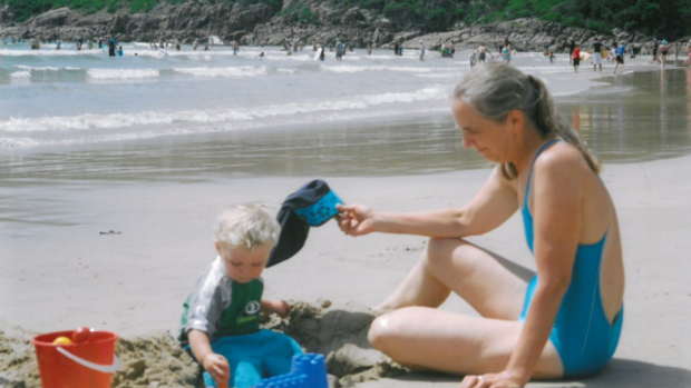 Greens senator Lee Rhiannon with her grandson on the NSW coast.