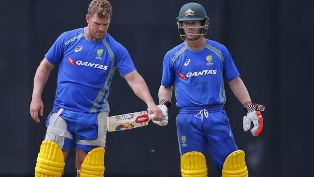 Ready for battle: Aaron Finch and Dave Warner in Colombo.