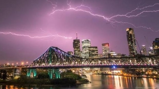 Lightning and strong winds are expected to strike Brisbane by early evening.