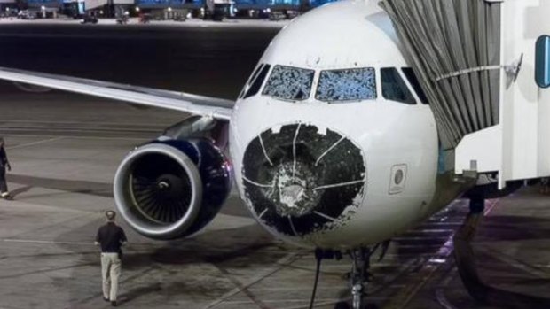 The badly damaged Delta plane after it flew through a hail storm. 