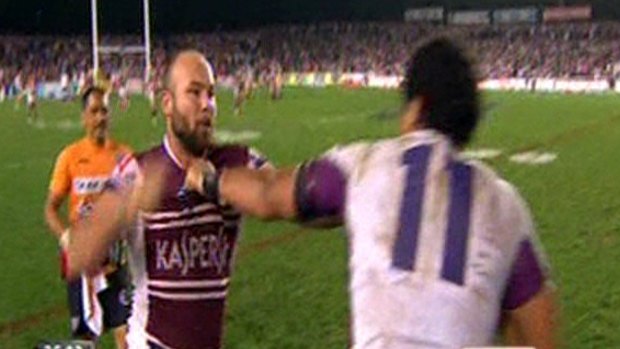 The Battle of Brookvale: Manly's Glenn Stewart and Melbourne's Adam Blair continue their fight after both were sin-binned.