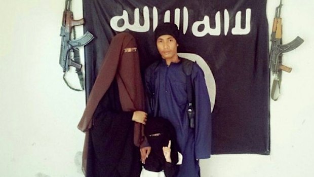 Malaysian police say  Muhammad Wanndy Mohamad Jedi (right) has been using social media to recruit Malaysians and plot terrorist attacks.