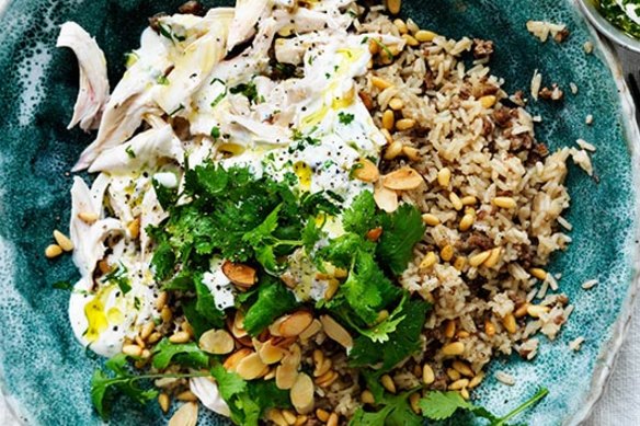Feast on this: Fragrant poached chicken with spicy, nutty rice.
