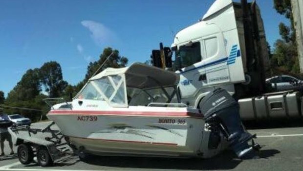 The chaos continues: a boat came off its trailer in Armadale on Monday morning.