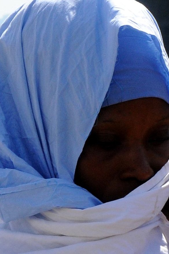 An asylum-seeker in Palermo harbour last week. 