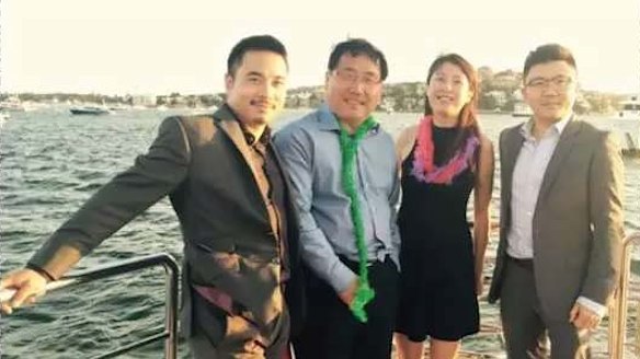 Simon Zhou (left) with former Chinese consul-general in Sydney, Li Huaxin (second from left) and two others.