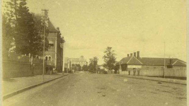 William Street looking east, 1898, with former DPI Building and Printery, before construction of Treasury Building. Augmented reality could be used to give another view of the Queen's Wharf precinct.