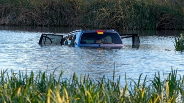 The three children died after a car was driven into a lake in Wyndham Vale.