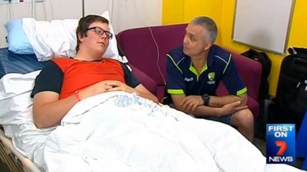 Josh and his father Richard Lawrie shown in his hospital ward at Nepean Hospital.