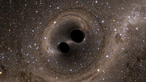 A simulation of two black holes colliding.