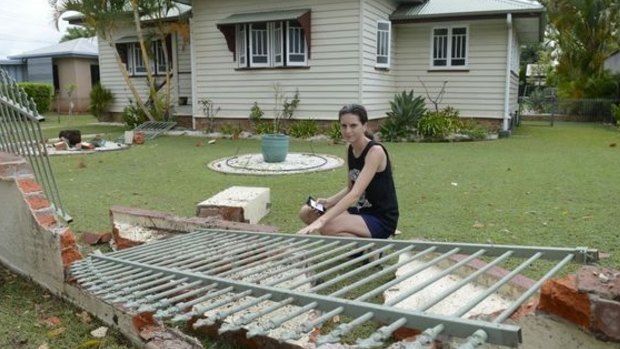 Emily Harvey in the front yard of her Avoca Street home which had an out-of-control car smash into the garden wall.