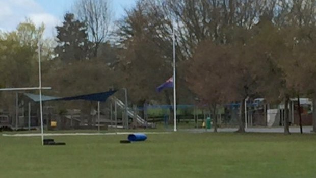 A flag iflies at half-mast at Reporoa Primary School in memory of Connor Brian Phillips, 11.