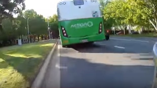 A near miss between a cyclist and a bus in Canberra on February 18.