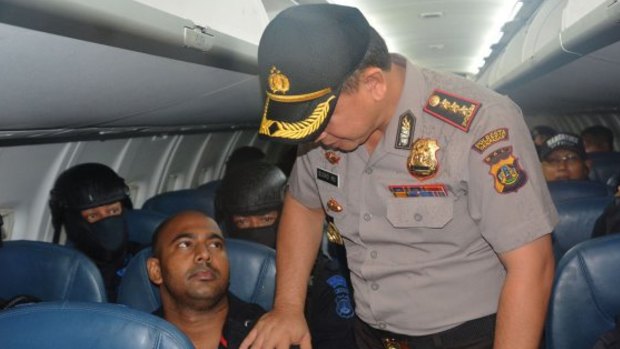 The Denpasar police chief poses with Myuran Sukumaran.