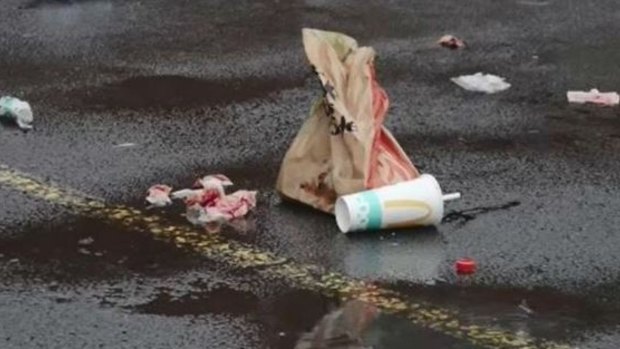 Bloodied McDonald's wrappers and serviettes at the scene of the brawl.