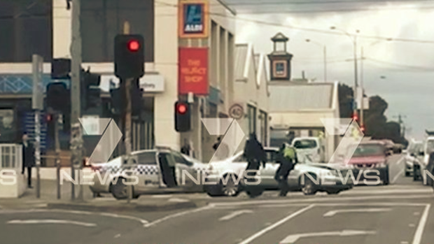 The scene after an Audi rammed a police car, police officer and a Subaru on Wednesday.