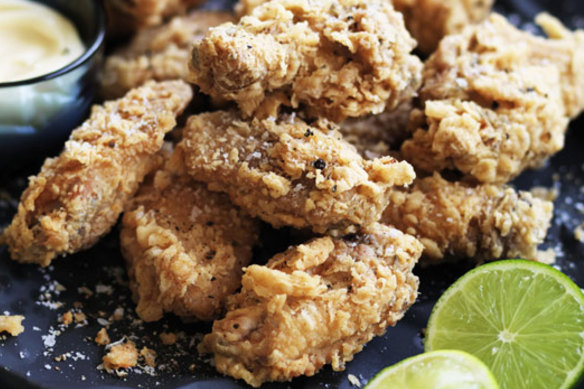 Neil Perry's fried chicken wings with garlic and rosemary.