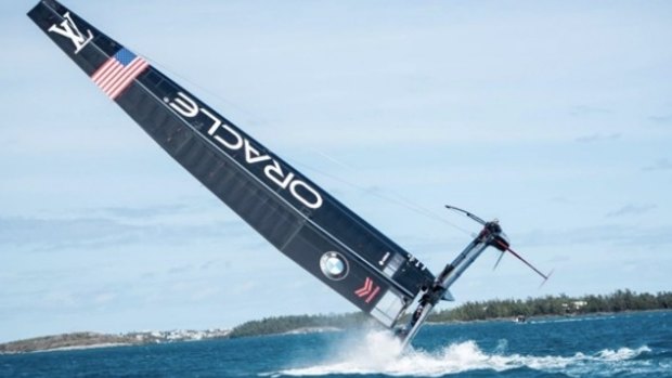 Over she goes: The Oracle boat tips over in Bermuda.