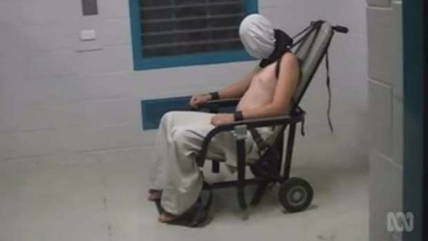 The ABC's <em>Four Corners</em> program showed Dylan Voller, then 17, with a hood over his head and strapped into a chair by his ankles, wrists, shoulders and neck. 