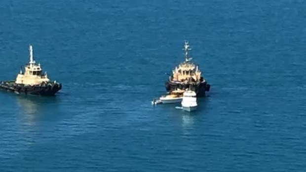 The boat upturned off the Queensland coast.