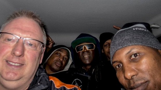 Stars in a reasonably priced car ... Kevin Wells snaps a selfie to remember the ride of his life.