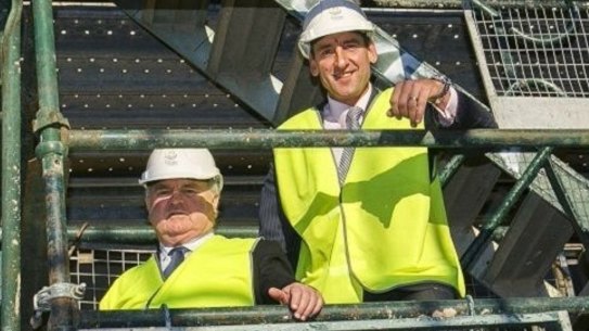 Outgoing Village Building Company managing director Bob Winnel with new chief executive officer Travis Doherty.