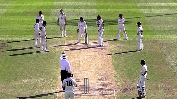 Crowded: Six Victorian fielders crowd the NSW batsmen.