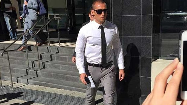 Police officer Daniel Jamieson leaves court after pleading not guilty