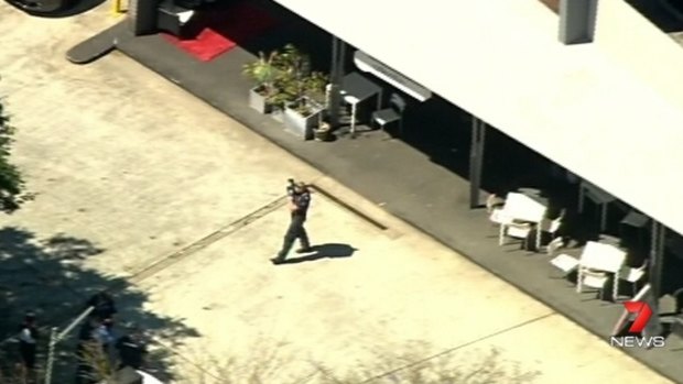 A man was shot outside a Clayfield shopping centre on Tuesday.