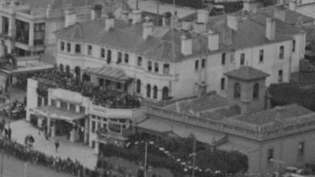 In this photo of the Esplanade Hotel believed to have been taken during a visit to Australia by Prince Albert in 1927, revellers can be seen on the rooftop terrace..