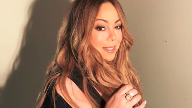 Mariah Carey on her way to the studio with the ring.