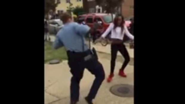 A still from the viral YouTube video showing Aaliyah Taylor dancing with a police officer in Washington DC.


dancingcop.jpg