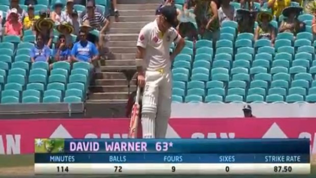 David Warner takes a moment after reaching 63 not out.