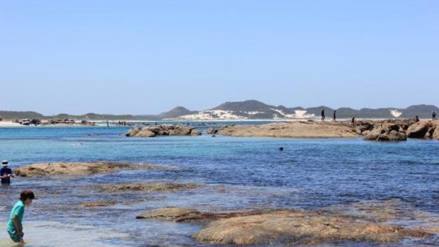 The man and a 21-year-old woman are thought to have been fishing when large swells knocked them into the water near Boat Harbour, east of Peaceful Bay.