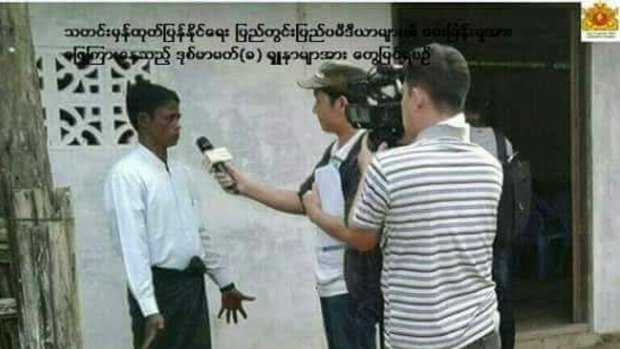 Sona Mia speaks to journalists in Ngakura village on December 21. This image was posted on the Facebook page of the Myanmar State Counsellor's Office.