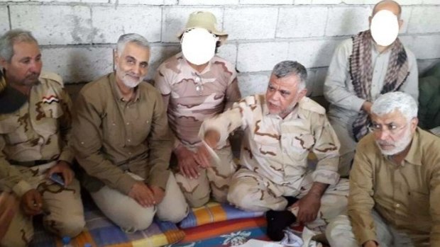 In this picture posted by the Iranian military, Major-General Qasim Suleimani, commander of Iran's paramilitary Quds Force, is seen second from left with Shiite leaders in Iraq. Fourth from left is Hadi al-Amiri, the leader of Iraq's Badr Organisation, and on the extreme right of the picture is convicted terrorist Jamal Jaafar Mohammed.