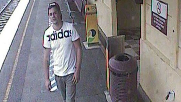 One of the men police are looking for over an alleged assault on an Ipswich line train.