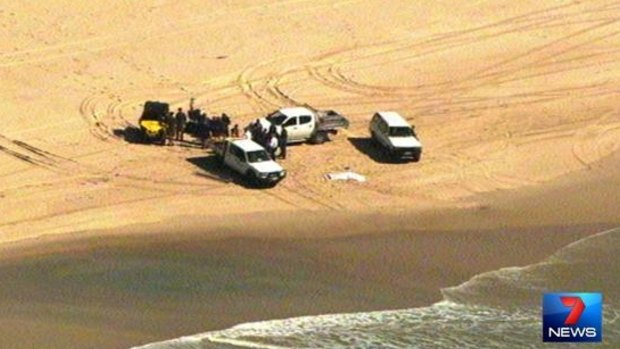 Police are on the scene after a man's body washed up on South Stradbroke Island.