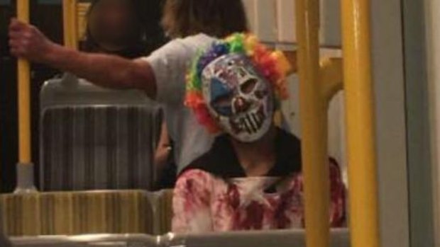 A clown photographed on public transport in Surfers Paradise on the Gold Coast.