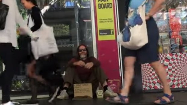It took Martin Green 2½ hours to give away $100 on Swanston Street in Melbourne.